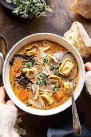 Healthier Slow Cooker Creamy Tortellini Vegetable Soup Half Baked Harvest Recipe In 2020 Half Baked Harvest Recipes Harvest Recipes Healthy Slow Cooker