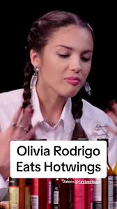 Olivia reacts to hot wings 🐥@Firstwefeast #oliviarodrigo #popstar #fyp  #asoueella #Olivia #wings #chicken #music #popstar #slay