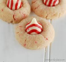 Eggs, sprinkles, sugar cookie mix, butter, hershey's kisses. Candy Cane Peppermint Kiss Cookies