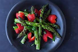 Assorted fruits and vegetables background. Balsamic Strawberry Asparagus Recipe