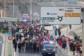 Spain installs floating barrier in Ceuta after deadly migrant rush | Reuters