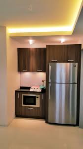 Modular Kitchen Cabinets With Built In Microwave Oven And Down Lighting Modular Kitchen Cabinets Kitchen Cabinets Built In Microwave Oven