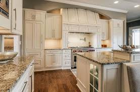 Kitchen With White Cabinets And Bianco Antico Granite Beige Kitchen Granite Countertops Colors Granite Countertops Kitchen