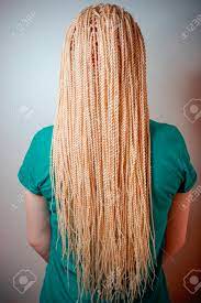Use the same color for each strand of string, or use different colors. Senegalese Twisted Pigtails Weave Through The Braid Many African Stock Photo Picture And Royalty Free Image Image 124946122