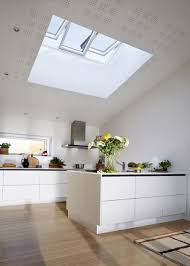 Velux windows in a home extension turned into a dining area. See The Whole Picture With Launch Of New Velux Studio Window Building Products