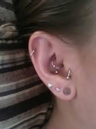 conch daith tragus helix pierced love multiple ear piercings ear piercings piercing tattoo