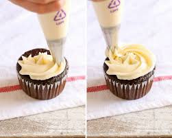 Press the wafer triangle onto the cupcake. How To Frost Cupcakes
