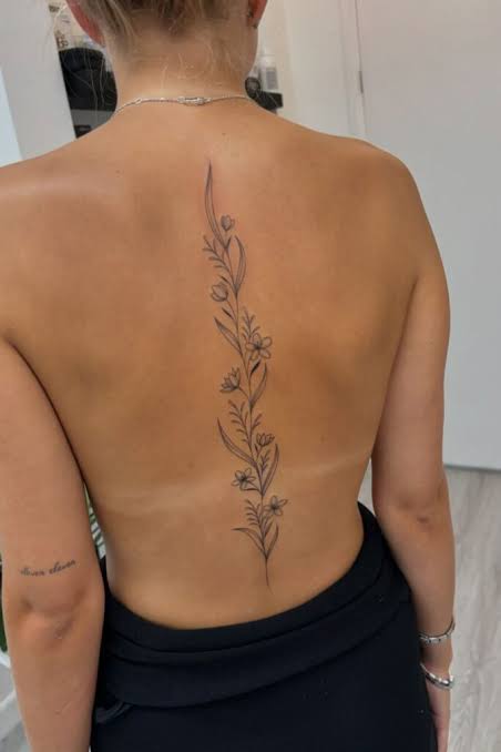 23 Spine Tattoos For Women That Are Beautiful, And Full Of Meaning