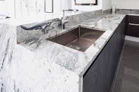 Wooden bar chairs have perfectly modern lines and this transitional kitchen has a style with those glass and stainless steel pendant lights! Pin On Ideas For The House