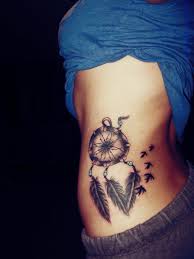 This is a dream catcher tattoos for women that uses a monochromatic approach and uses the intricacies of design elements to achieve a sense of depth and realism. 29 Dreamcatcher Tattoos With Birds