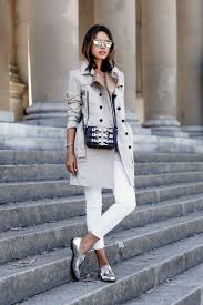 Casual Fashion Outfit Idea Wearing A Neutral Trench Coat White Cropped Jeans Silver Flat Shoes And A Buckle Detailed Cr Fashion Trench Coats Women Stylish