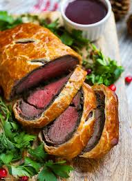 Each individual portion is served with a delicious red wine mushroom pan sauce. Beef Wellington With Red Wine Sauce What Should I Make For