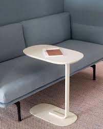 An Elegant Side Table With Two Planes Connected Through A Graphic Leg For A Modern Expression Pull The Relate Modern Side Table Side Table Office Space Decor
