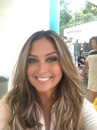 I'm 53 and still love my hair long. I'm not keen