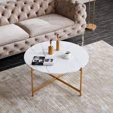 Simple and modern coffee table with round top finished in black color. 36 Modern Round Coffee Table With Metal Frame Gold