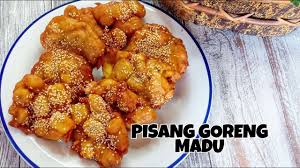 Potong pisang menjadi berbentuk koin dengan tebal yang seragam, ya. Resep Pisang Goreng Madu Wijen Youtube