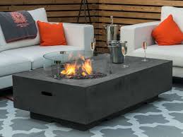 Fire pit tables would be the right option at your outdoor area for spending your fine evening with your loved ones, to have fun and enjoy the chill night. Nova Outdoor Living Cairns Gas Firepit Coffee Table With Wind Guard Firepit And Fire Bowl At Gardenman