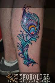 Bird feathers tattoo on neck. Feather Tattoo Follow Me Here Https Www Facebook Com Loliinkoholiks Fref Ts Peacock Feather Tattoo Feather Tattoo Hairline Tattoos