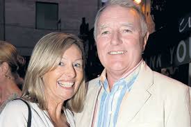 The man in the Canali suit