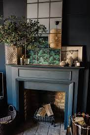 How To Use Living Room Wall Mirrors The Right Way Glamorous Living Room Dark Living Rooms Living Room With Fireplace