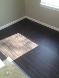 I'm redoing our family bathroom and have purchased the allure trafficmaster vinyl plank flooring from home depot (in cherry). Allure Plank Ironwood Home Depot Against Taupe White Shades Sofielund Abstrakt Colors Luxury Vinyl Flooring Vinyl Flooring Flooring