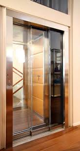 a full glass wittur hydra elevator door with full glass frames create a fresh and open look elevator inside elevator design elevator interior glass door design
