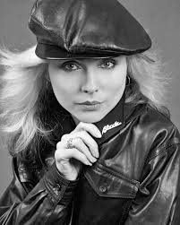 Jackie Fox of the band The Runaways cooks in the kitchen of her family home  in Woodland Hills, California. 📷 Michael Ochs Archives/Getty