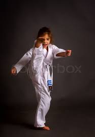 Yellow signifies the first beams of sunlight that give a seedling new growth and new life. A Little Girl Karate In A White Belt Stock Image Colourbox