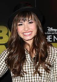 The first picture featured a very young photo of her grandfather. Demi Lovato Vogue It