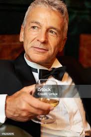 Good Looking Man With Brandy Stock Photo