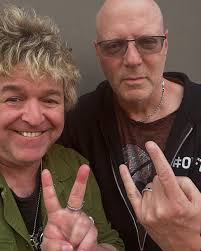 December 8, 2024 I am at Strawberry Fields in Central Park among hundreds  of people who are gathered to celebrate and remember John Lennon