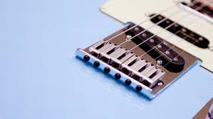 Guitar intonation tuning is making the notes of each fret of a string equal to the chromatic compare the twelfth fret note to the corresponding twelfth fret harmonic pitch with electronic tuner for meter. Guitar Intonation How To Intonate A Guitar Or Bass Fender Guitars