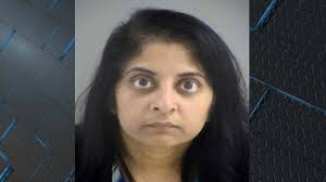 Woman arrested after fires at Holiday Inn near airport