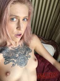 Naughty teen whore with tattooed chest and piercing takes nude selfie 11  photos