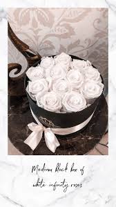 Maybe you would like to learn more about one of these? Medium Black Box Of White Infinity Roses Preserved Rose Arrangements Delivery The Luxury Roses Of London