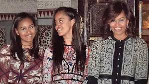 So people in the alternative media have wondered for a long time who malia and sasha's real parents are (being that michelle is most likely a man). Ellen Degeneres Sorry Michelle Obama That Daughters Are Back Home Hollywood Life
