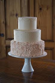 Ivory And Light Pink Buttercream Wedding Cake Random Elfenbein Und Hellrosa Buttercreme Hochzeits Simple Wedding Cake Pink Wedding Cake Ivory Wedding Cake