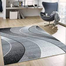 The color combination in grey and teal living room provides you a delightful look that will make the area perfect for gathering. Living Room Rug Modern Rug With Curved Lines Design Patterns Grey Black White Colors R7325 Ceres Webshop