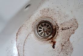 why does my kitchen sink smell like sewage?