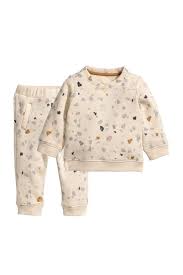 sweatshirt and pants light beige patterned kids h m us baby girl pants neutral baby clothes baby clothes patterns
