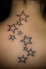 Falling Stars Down The Neck Neck Tattoo Star Tattoo Designs Tattoo Designs For Girls