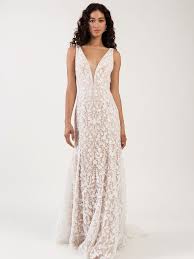 From traditional to modern to boho, with jumpsuits in between! 35 Beach Wedding Dresses Perfect For Your Seaside Ceremony