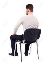 See over 479,369 sitting images on danbooru. Back View Of Business Man Sitting On Chair Bearded Man In A Stock Photo Picture And Royalty Free Image Image 62133529