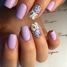 Uñas decoradas con dos uñas diferentes a las otras tres una tiene flores blancas y el resto de la. Unas Decoradas Imagenes Ideas Y Disenos 2020 Increibles