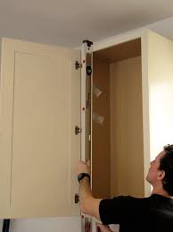 A stud finder, measure tape. How To Install Kitchen Cabinets Old House Journal Magazine