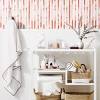 Forgoing a vanity for a floating sink looks more modern, but doesn't add much in the way of storage. 3