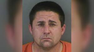 Florida man finds naked intruder in bed