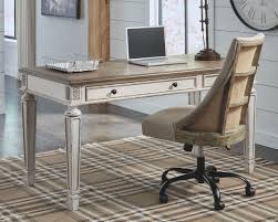 Our air conditioned showroom showcases a variety of desks, office chairs, cubicles, conference tables and more making your shopping experience easy and hassle free. The Realyn White Brown Home Office Desk Swivel Desk Chair Available At 5 Star Furniture Serving Dallas Tx And Garland Tx