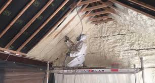 A hole is cut into the wall. How Much Does Spray Foam Insulation Cost In Ireland