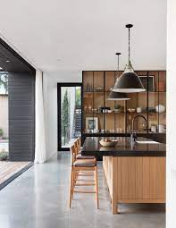 All white kitchen with white moldings and cabinetry, wood top island, wide plank wood flooring, brass hardware. 900 Kitchen Trends Design Ideas In 2021 Kitchen Design Kitchen Inspirations Home Kitchens